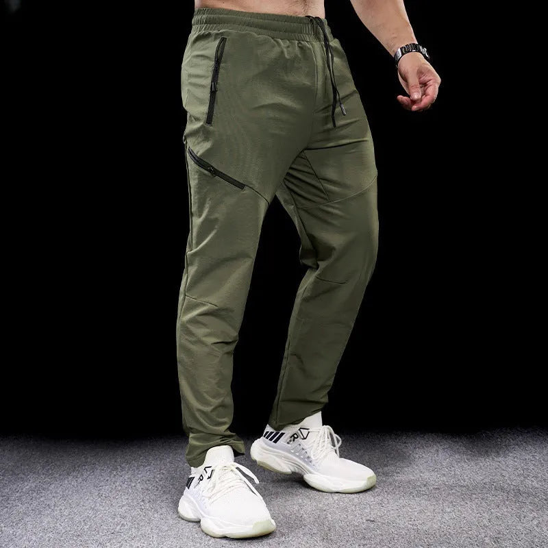 Men's waterproof quick-drying exercise pants in nylon fabric for sports and fitness activities