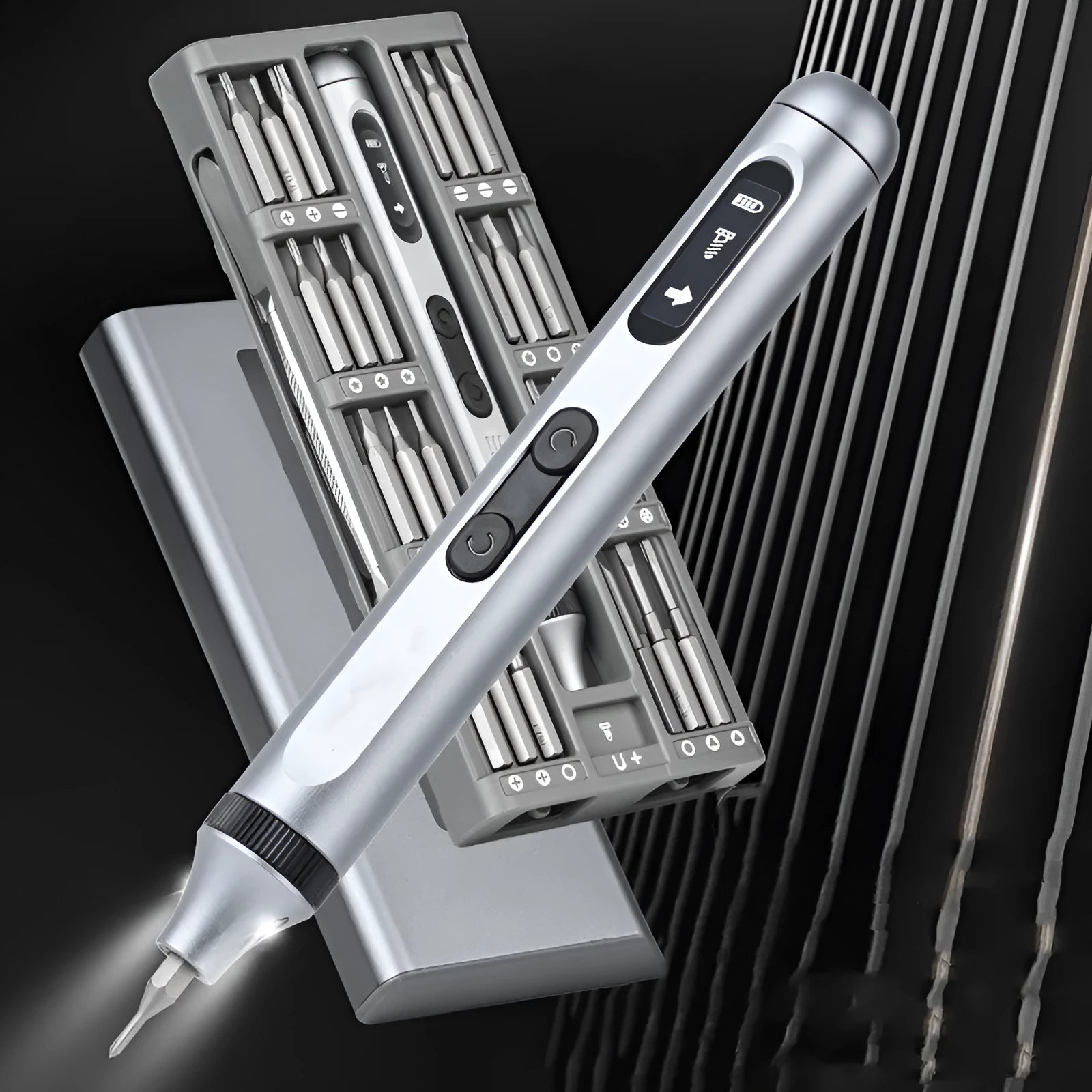 Compact aluminium electric screwdriver showing scale, displayed with its charging cable and bits.
