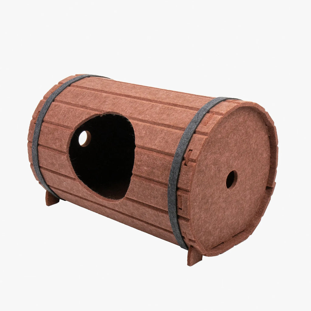 Assembled wine barrel-shaped cat bed made from soft grey polyester fibre felt.