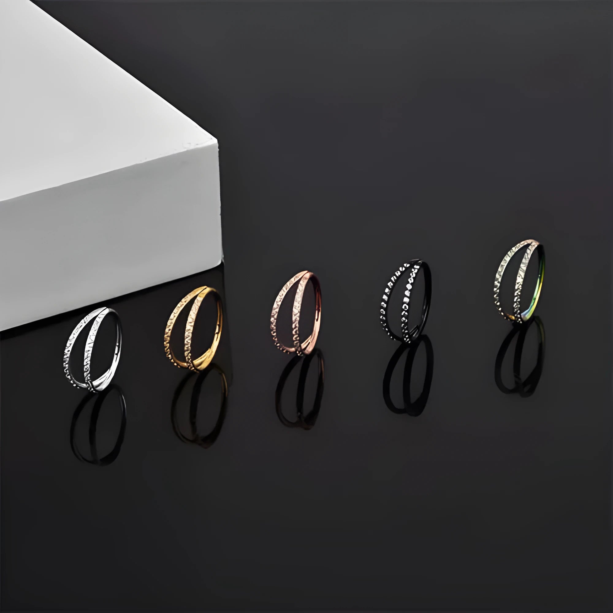G23 titanium alloy nose ring earring in steel colour, showing a circular ring design for body piercing.