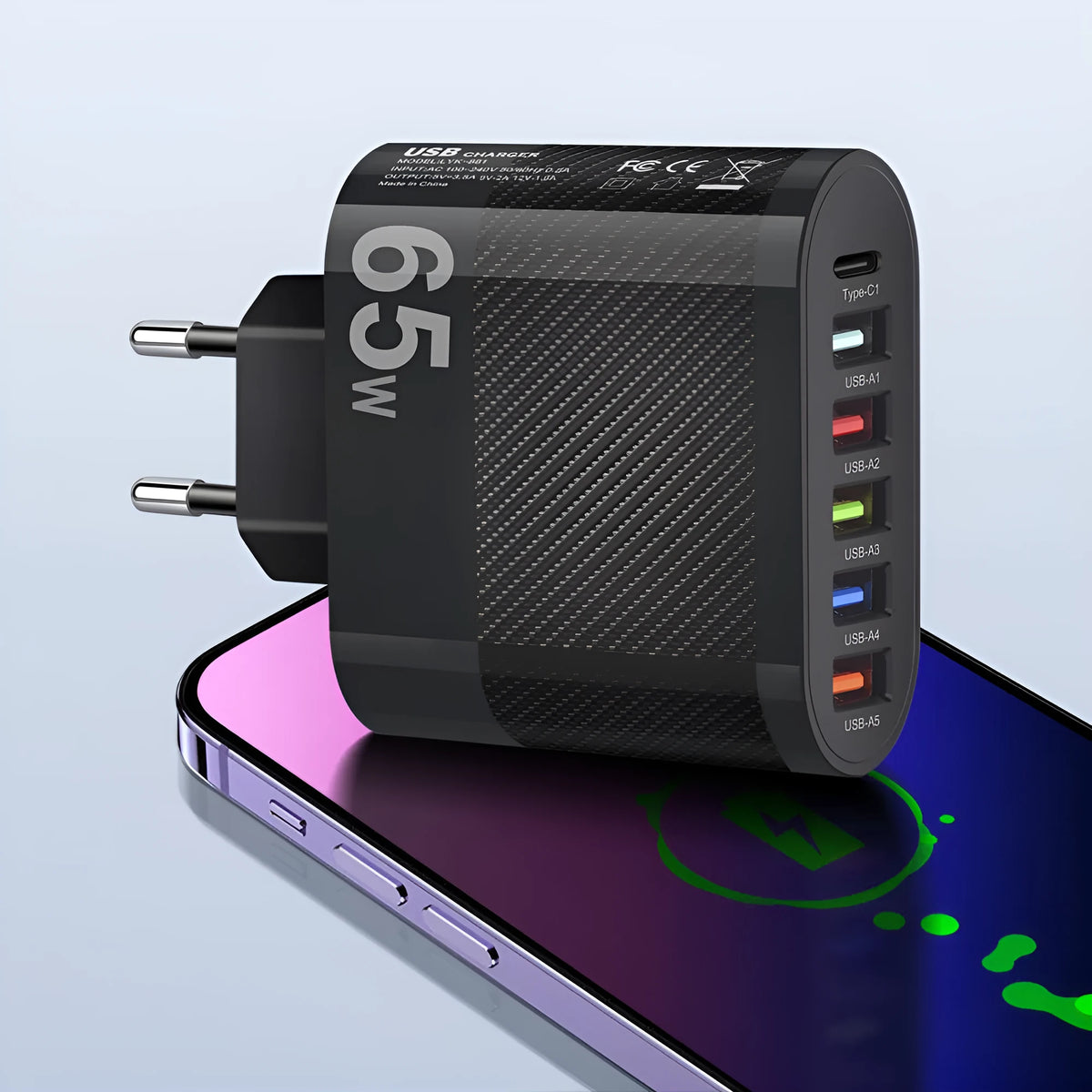 Type-C multi-interface charging plug showing EU, UK and US outlet compatibility with USB charging port