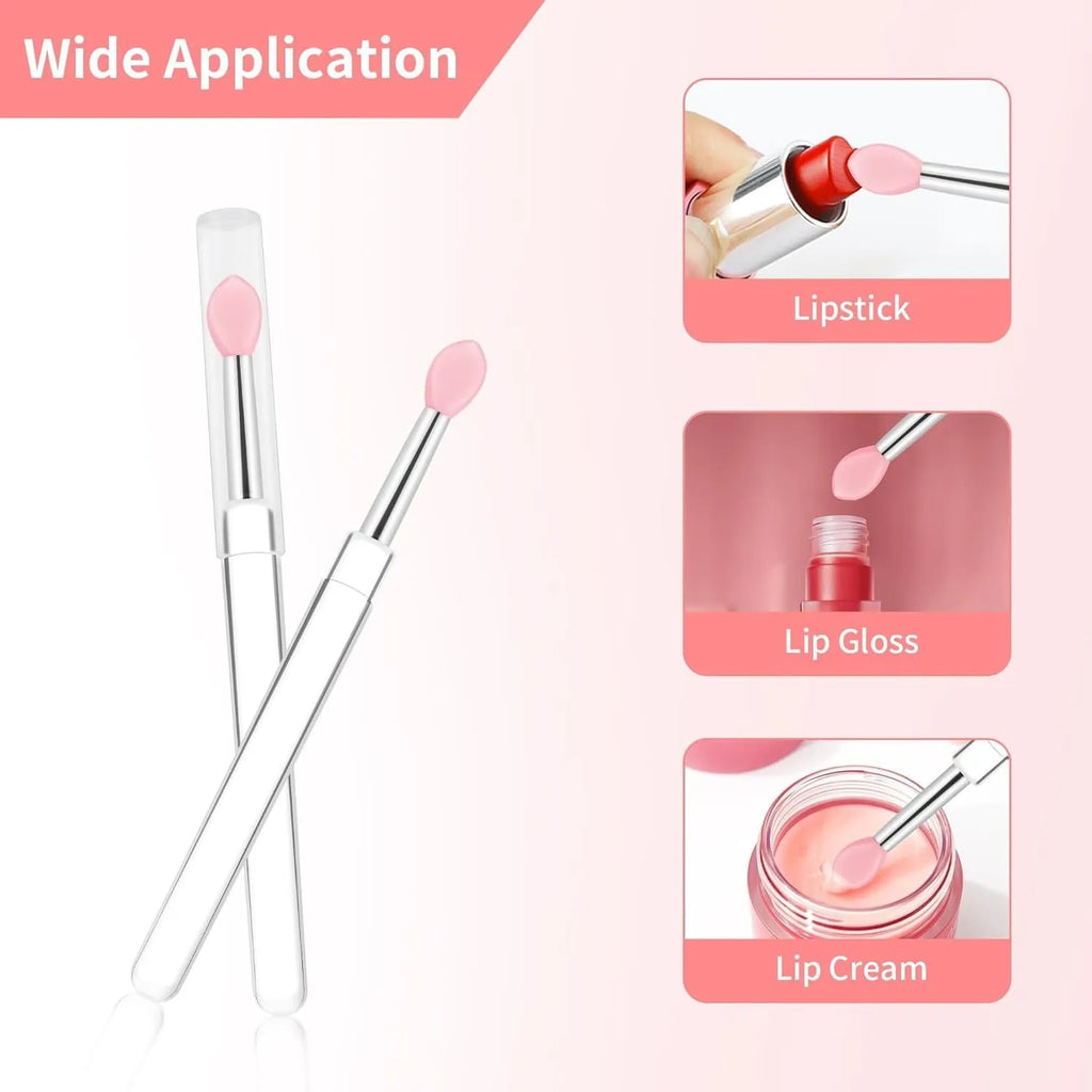 Set of four silicone lip brushes with protective caps in various colours for makeup application