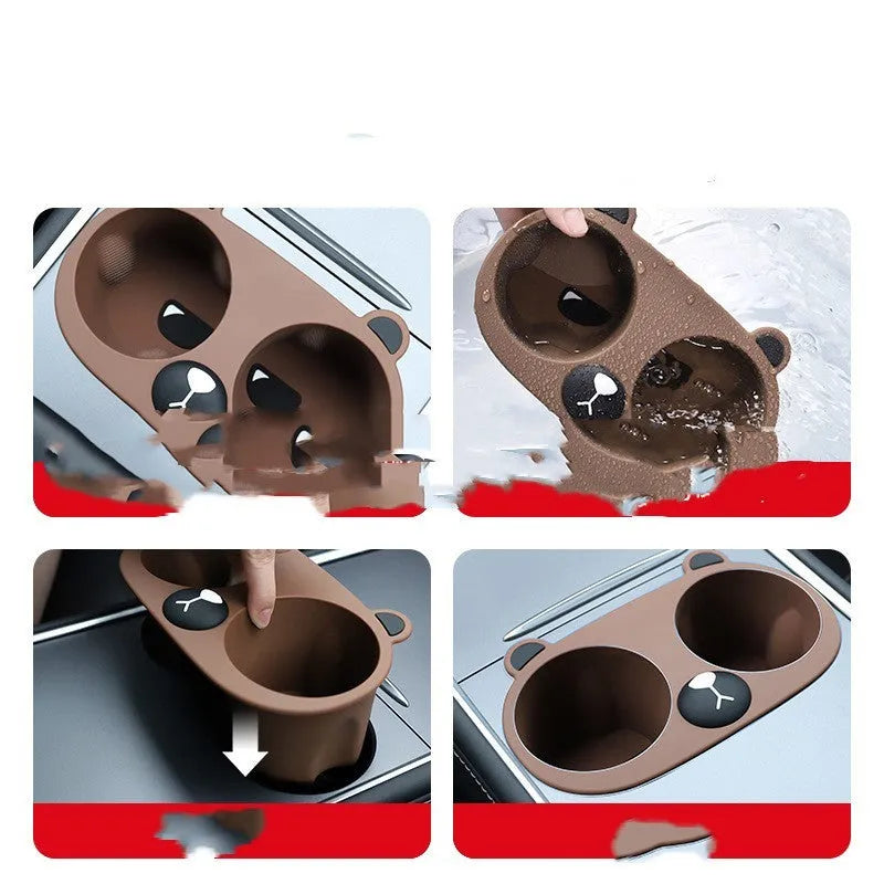 A grey silicone insert designed to fit into a car's central console cup holder to stabilise drinks.