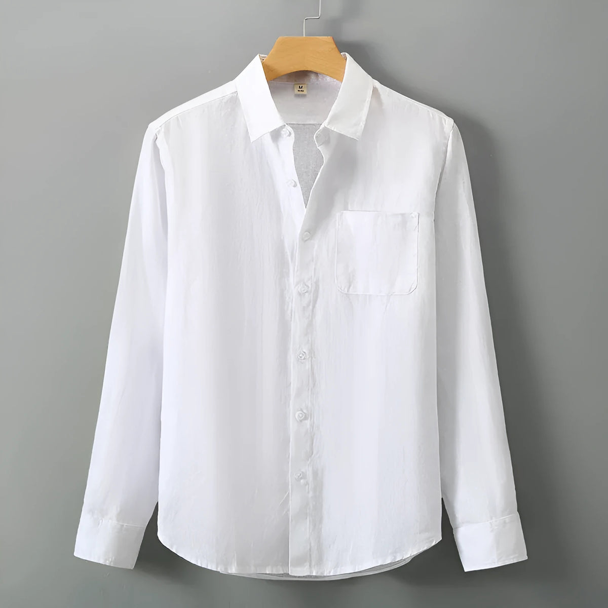 Long sleeve linen cardigan shirt in a loose Chinese style fit, shown in a solid colour.