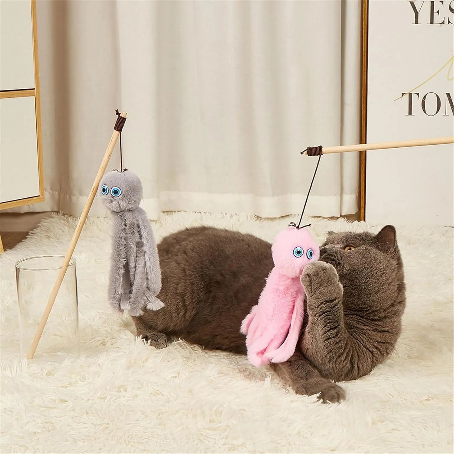 Octopus-themed cat toy with long stick handle and colourful furry texture for indoor kitten play