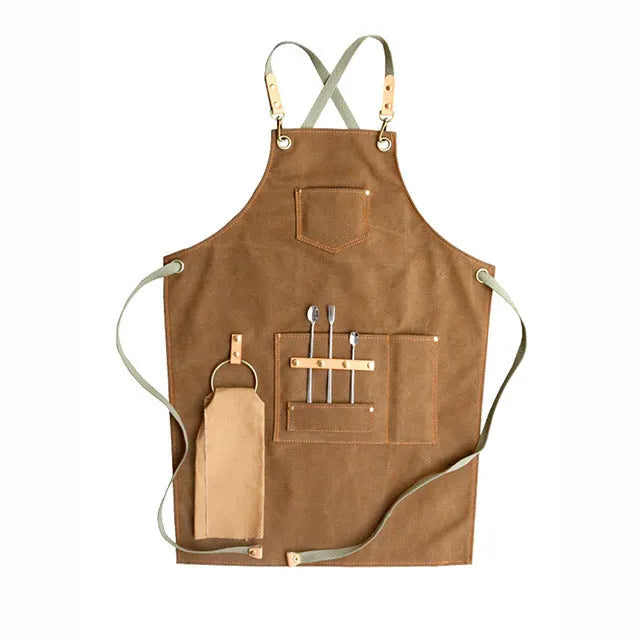 Canvas apron with cross strap back design in camel colour for baking and gardening protection