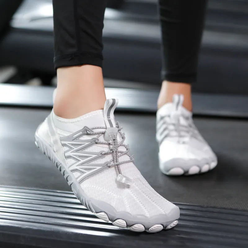 Lightweight non-slip training sneakers in multiple colours on a gym floor