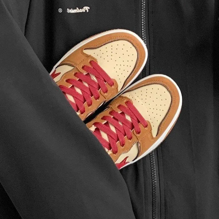 Brown women's low-top sneakers with sequin trim and platform heel on rubber sole.