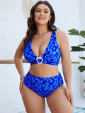 Blue floral patterned two-piece bikini swimsuit for plus size women.