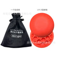 Orange golf training mat with centre of gravity pattern on natural rubber surface