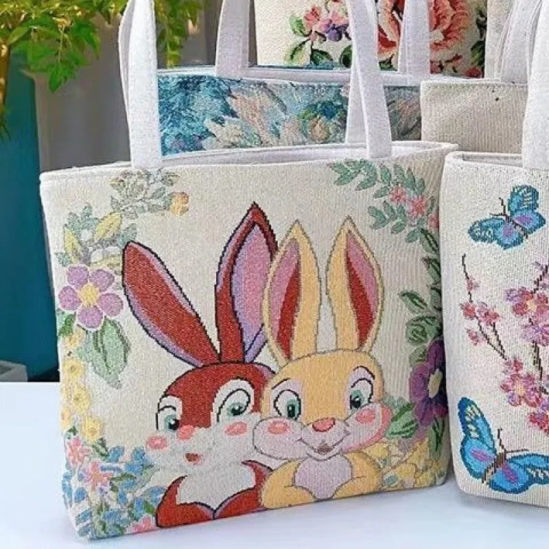 Double-sided gold wire embroidered canvas tote bag in botanical design with polyester construction