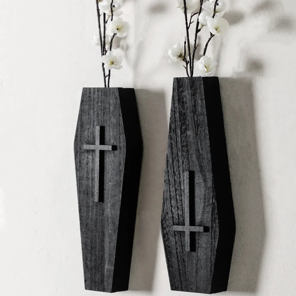Black wooden cross wall shelf decoration with display ledge measuring 27 by 9 centimetres