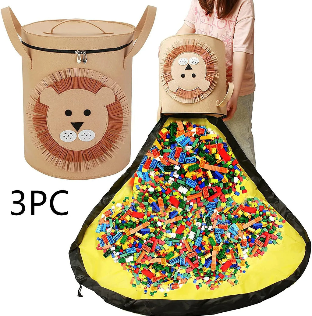 Green cube-shaped felt storage bag with pull rope, laid flat as a play mat.