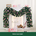 2.7 metre pink Christmas rattan garland decoration with small fruit details and optional lighting