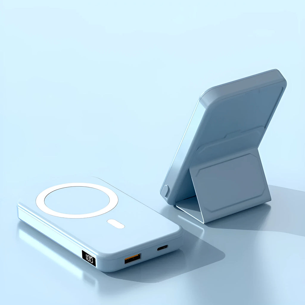 Magnetic wireless charging power bank with folding stand open, showing colour options on a table.