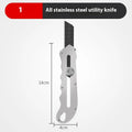 Stainless steel folding art knife with black blade and a pack of long and trapezoidal blades.