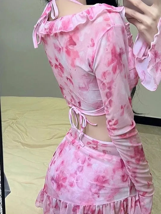 Women's cherry blossom pink floral bikini swimsuit set on a mannequin, showing front and back views.