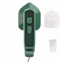 Dark green portable handheld steam iron with ceramic panel, shown next to clothing on a hanger.