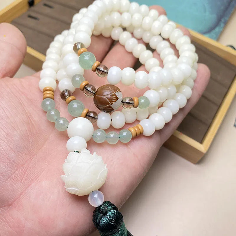 White jade bodhi bead bracelet with 108 beads, showing pattern and size options.