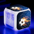 Square cartoon alarm clock with a football pattern design, showing a four-sided mute alarm for children.