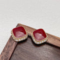 Red square geometric earrings with retro plate design
