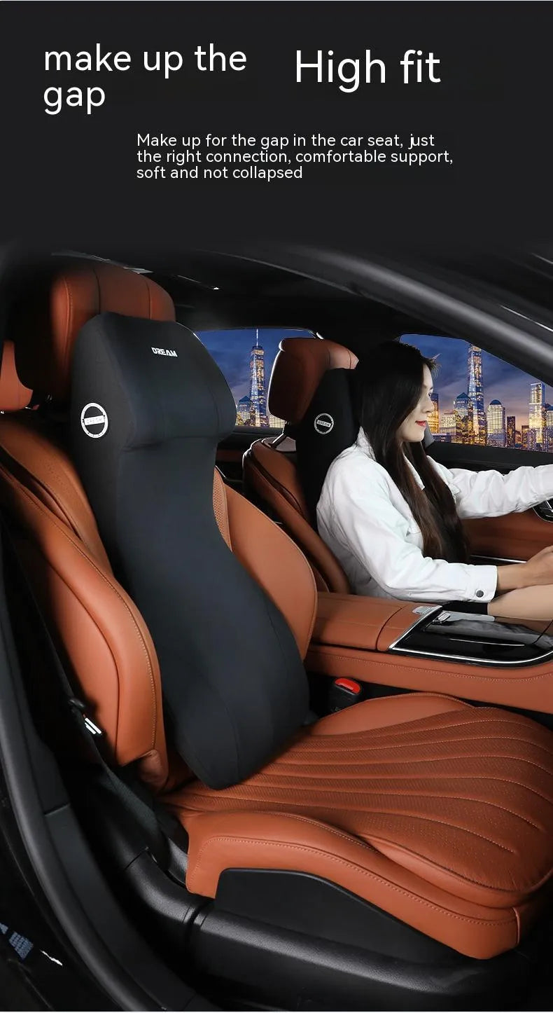 Black automotive memory foam seat cushion with integrated lumbar support headrest pillow.