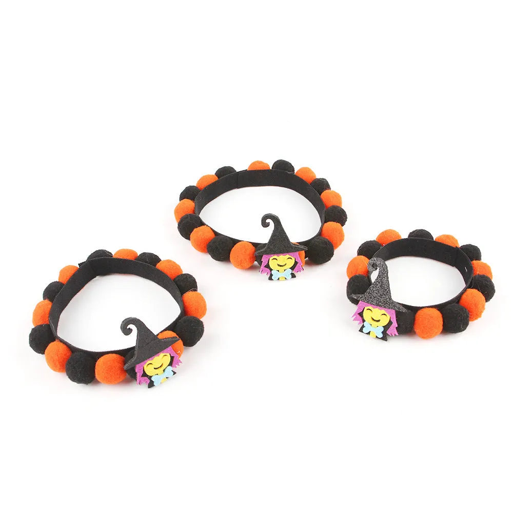 Halloween pet collar with fur ball decoration in pumpkin, skull, witch, and bow designs.