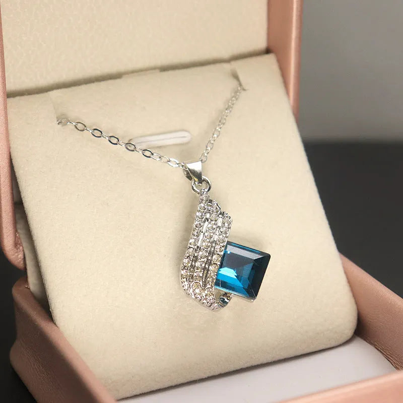 Women's necklace and earring set with cross chain design in alloy and glass with electroplated finish
