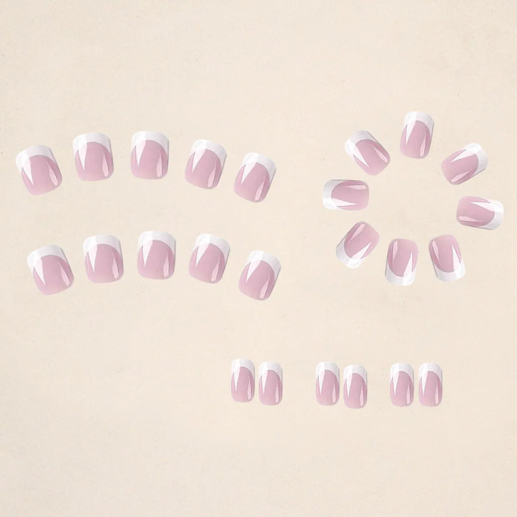 24 white fake nails with a black and grey plaid pattern, laid out as press-on nail tips.
