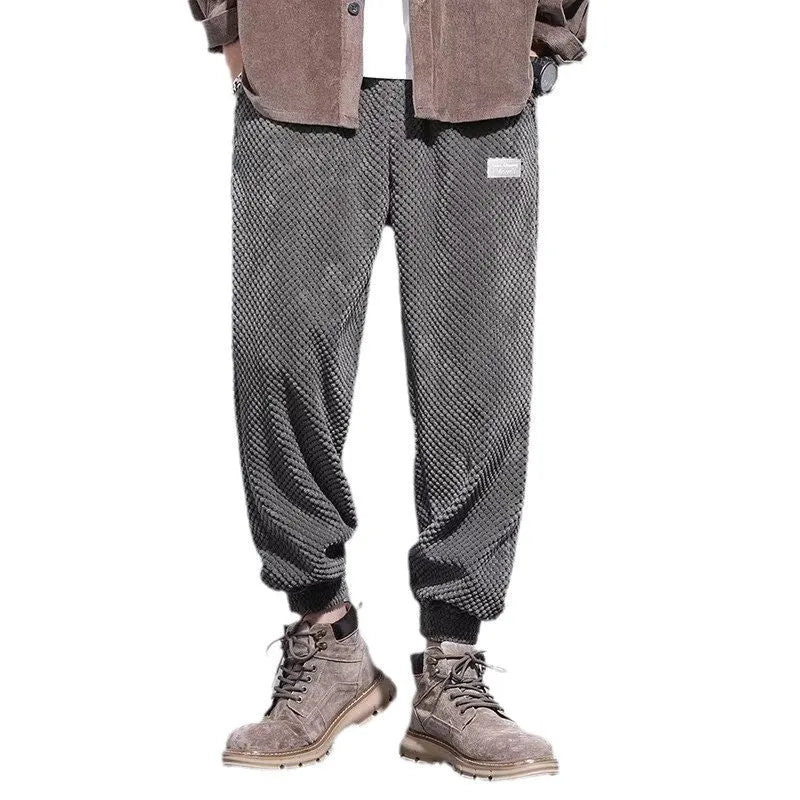 Men's grey straight leg sweatpants with ankle tie fastening on waistband