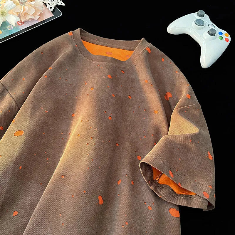 Men's loose fit ripped T-shirt in cotton with distressed design on round neck short sleeve
