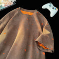 Men's loose fit ripped T-shirt in cotton with distressed design on round neck short sleeve