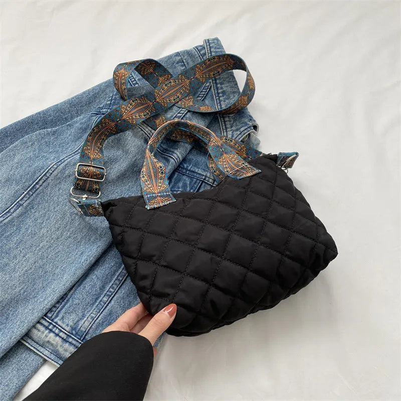 Oxford cloth messenger bag in horizontal square shape with single shoulder strap and sandwich pocket