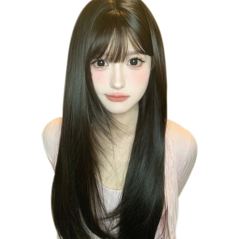 Dark brown long straight synthetic wig with fringe for round face shapes on wig head