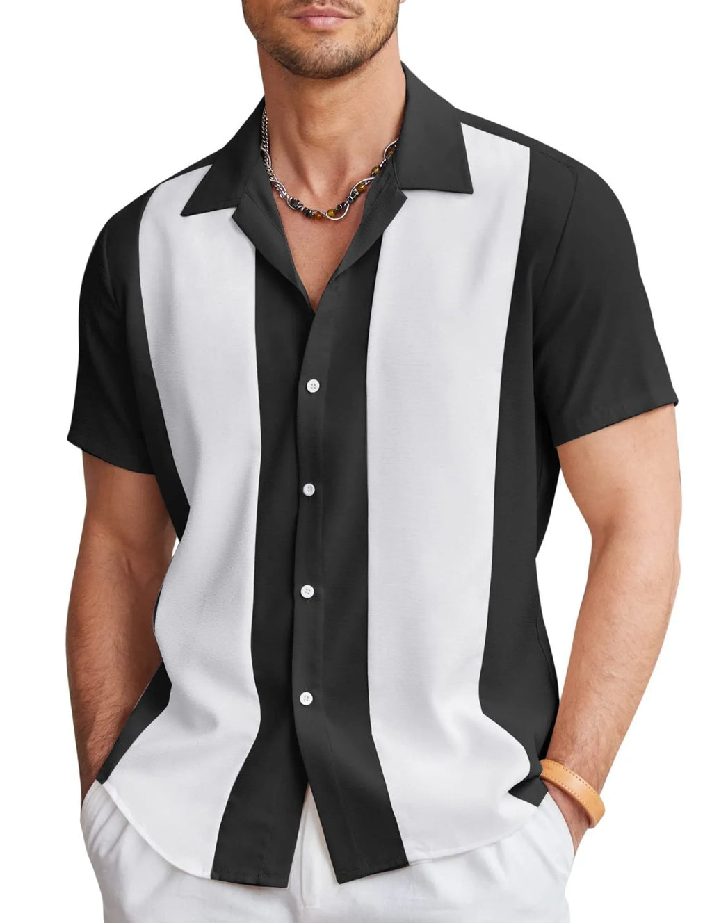 Man wearing a slim fit, short sleeve Hawaiian print shirt in a cardigan style.