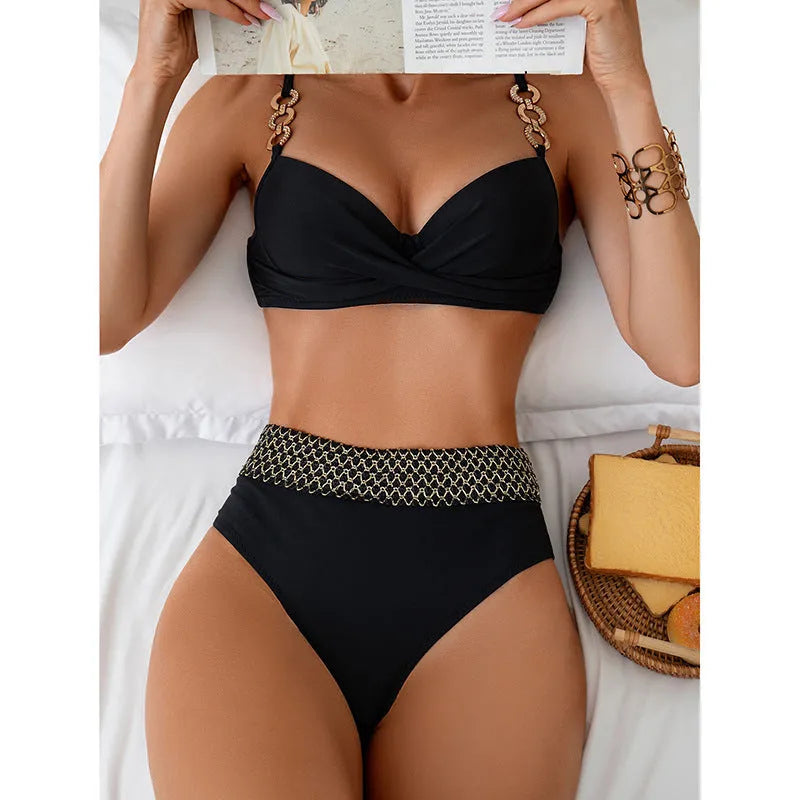 Black two-piece bikini swimsuit set with sleeveless top and briefs on a mannequin