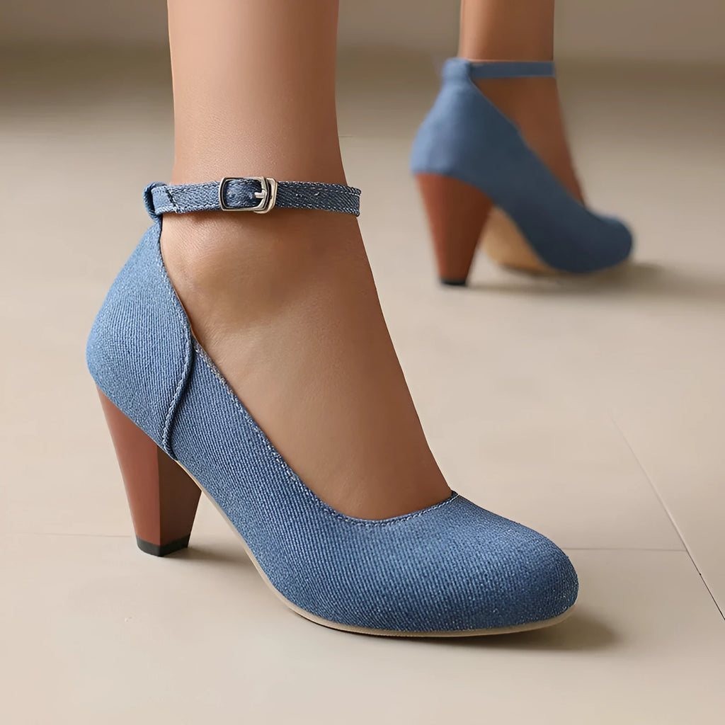 Blue denim women's high heel ankle boots with a silver buckle and waterproof platform sole.