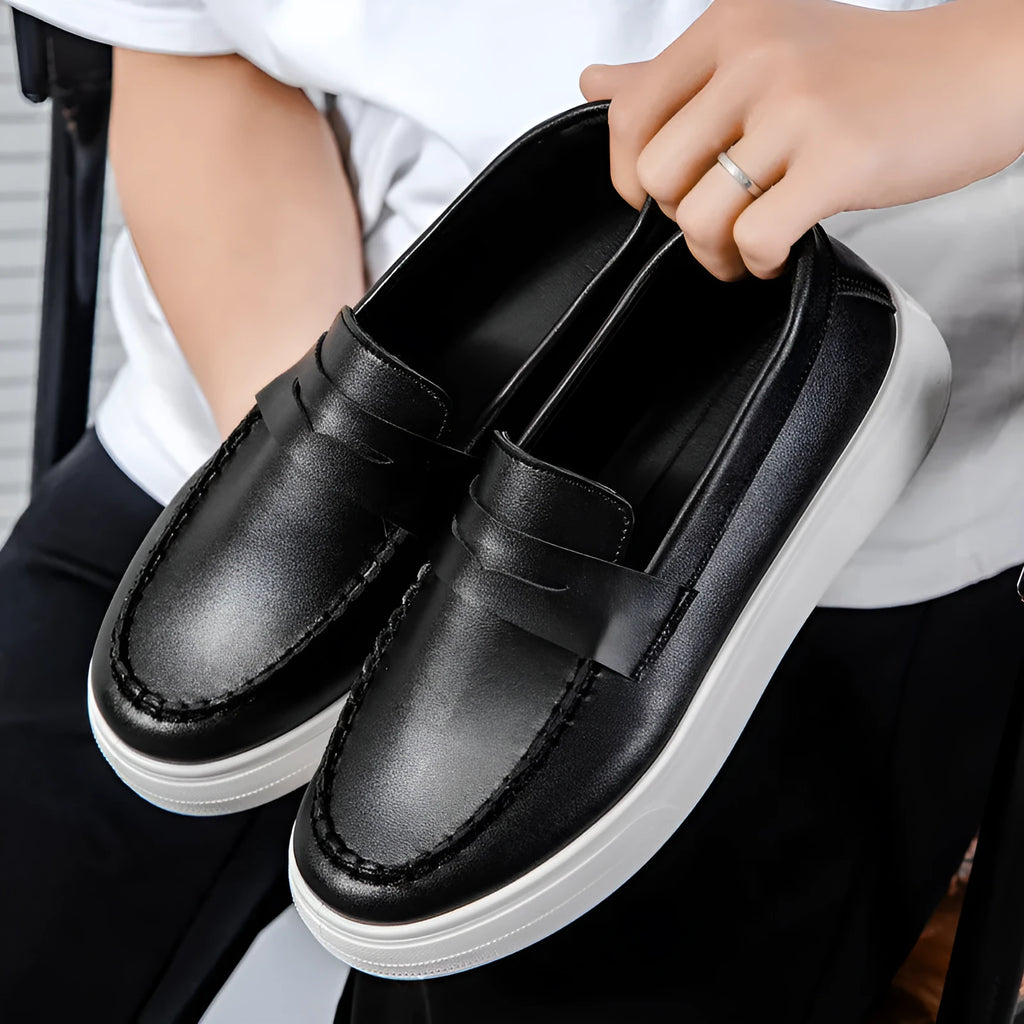 PU artificial leather slip-on casual shoes in white, shown in a side view on a neutral background.