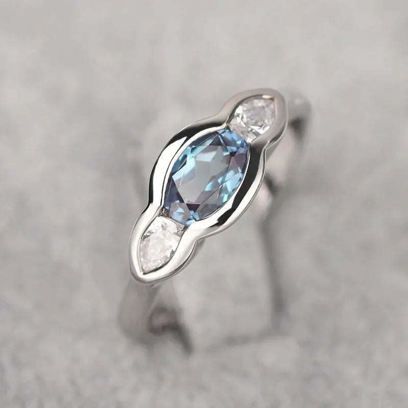 Women's geometric ellipse ring with zircon inlays in Q941 white gold finish