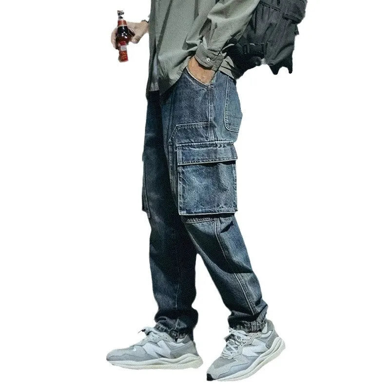Blue men's loose straight leg jeans with zip fly in polyester stretch denim fabric