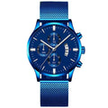 Men's stainless steel watch with mesh band and analog dial on wrist