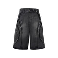 Distressed raw edge denim shorts in a straight-leg cropped fit on a hanger.