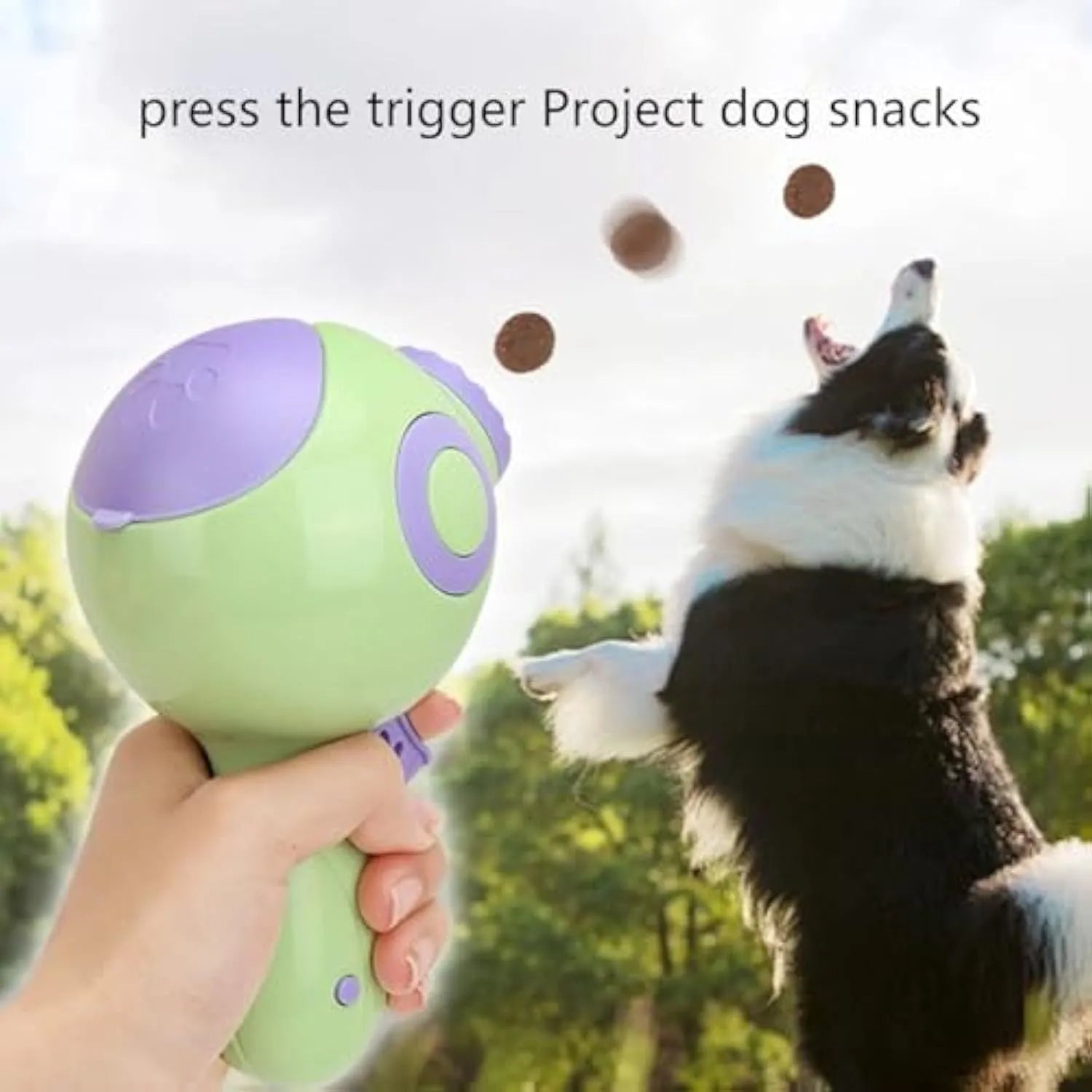 Green, orange, and pink dog treat launcher toy and slow feeder dispenser on a white background.