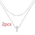 S925 sterling silver double layer twin diamond cross pendant necklace on a clavicle chain.