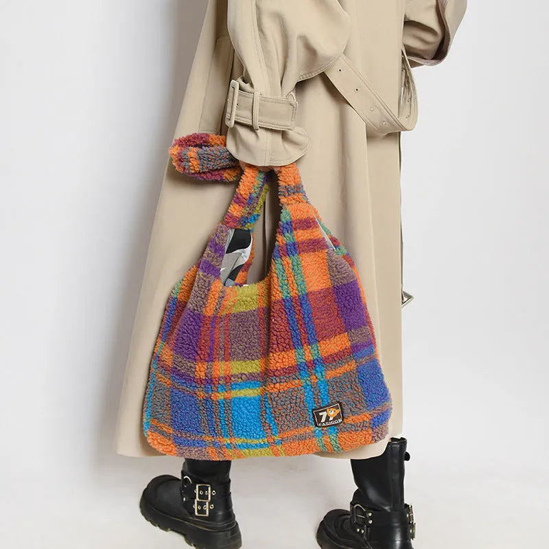 Women's plaid crossbody tote bag in soft plush material with shoulder strap and zippered compartment