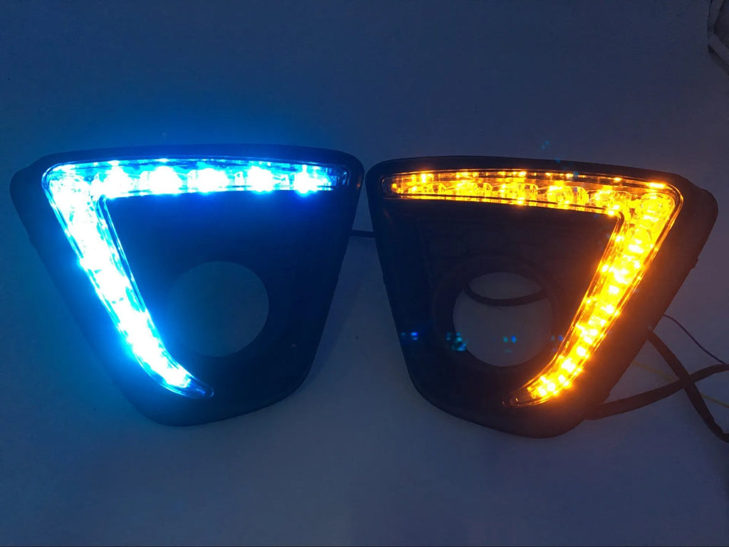Pair of electroplated Mazda CX-5 daytime running light LED bulbs on a white background.
