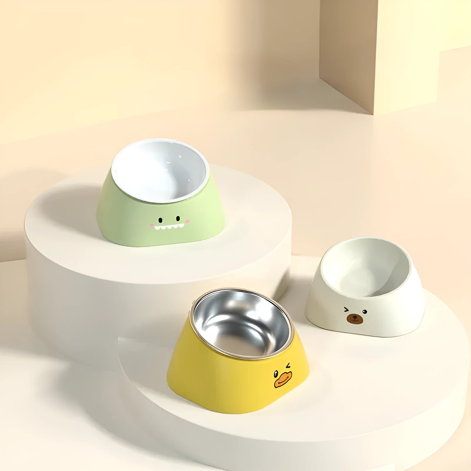 Green 15-degree tilted pet feeding bowl with stainless steel interior and wide PP base for cats and dogs.