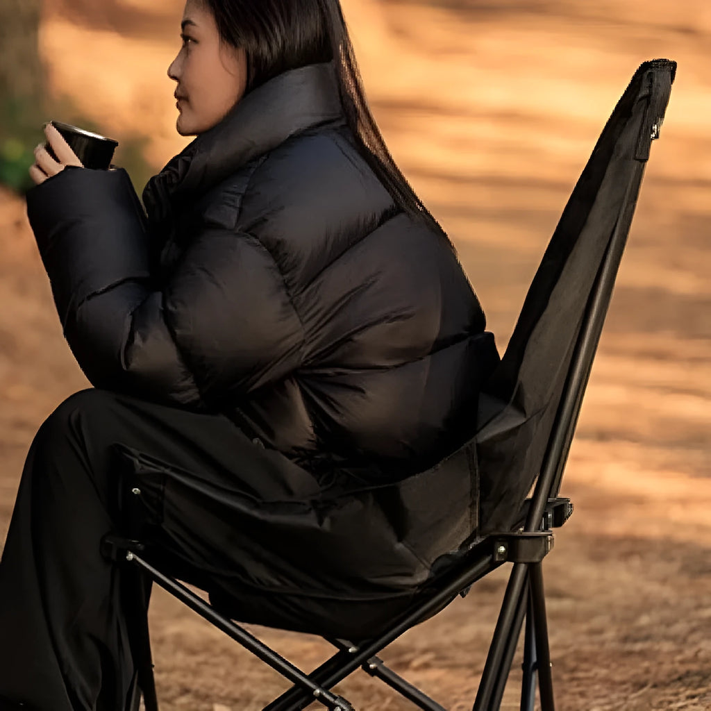 Night black camping recliner chair folded and unfolded showing Oxford cloth material and moon chair design