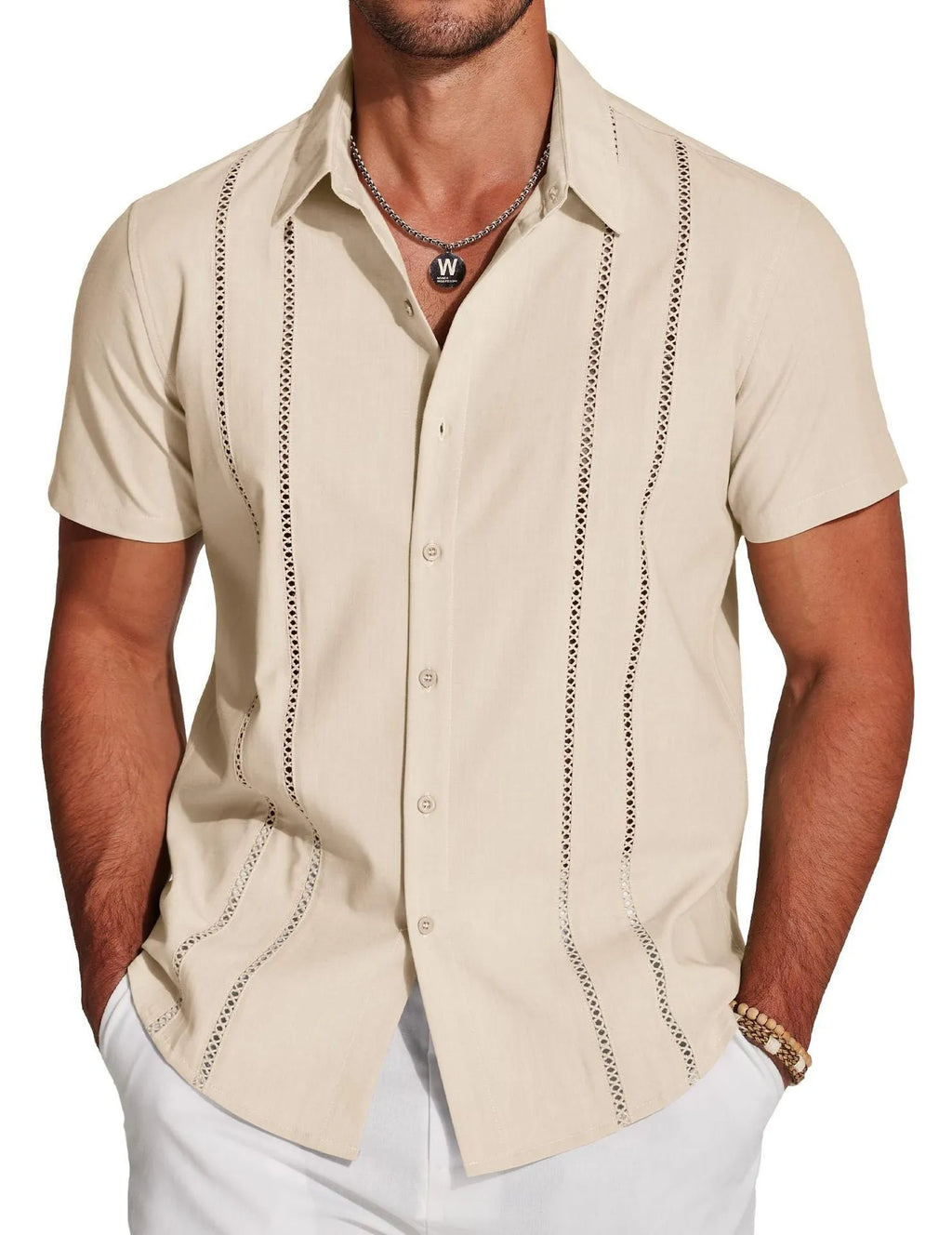 Man wearing a slim fit, short sleeve printed Hawaiian shirt in elastic polyester fabric.