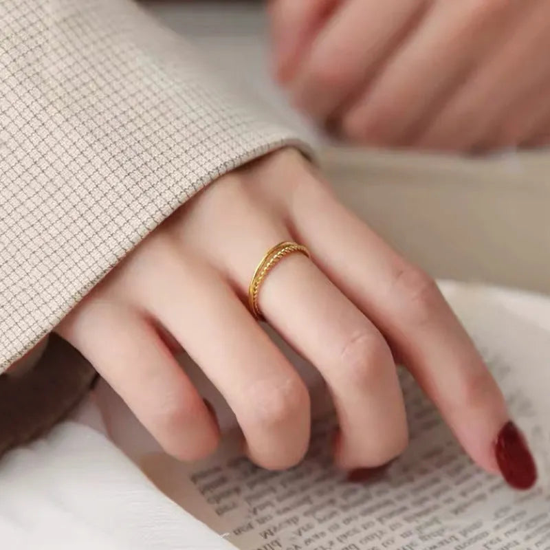 Brass gold plated women's bracelet ring showing twist, matte, and glossy finish options